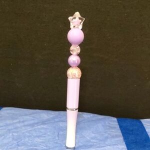 HANDMADE BEADED PENS COLOR PURPLE  TOPPER IS A STAR GREAT GIFT